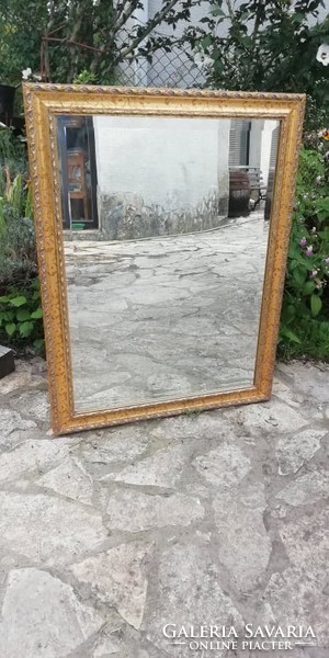 Beautiful gilded wooden frame with polished mirror, large size