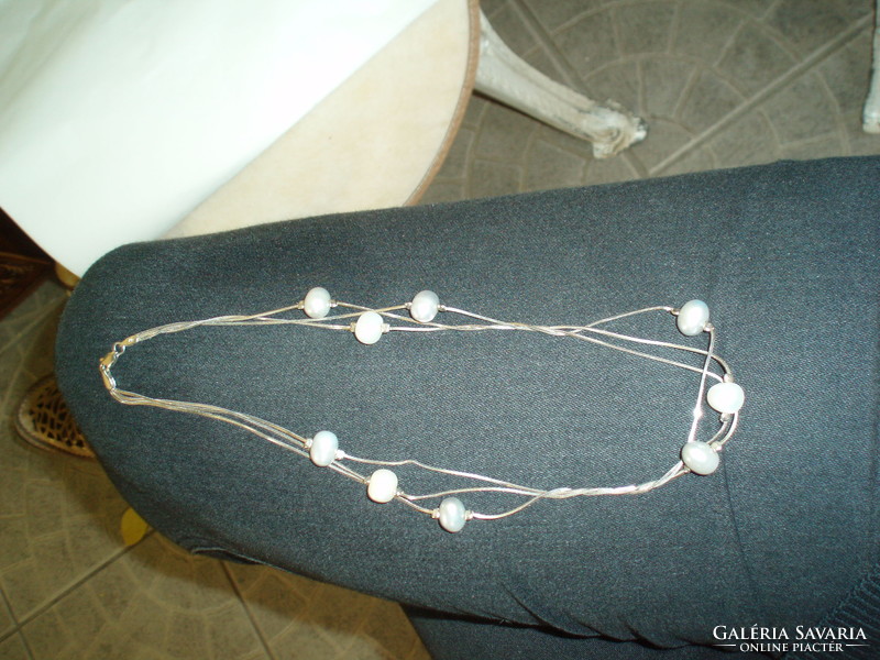 Beautiful 3-row silver necklace with large true pearls.