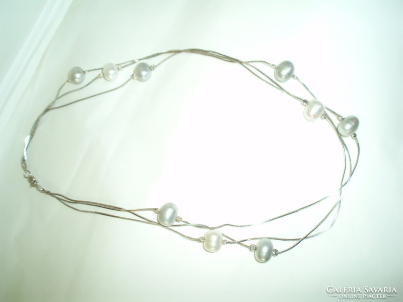 Beautiful 3-row silver necklace with large true pearls.