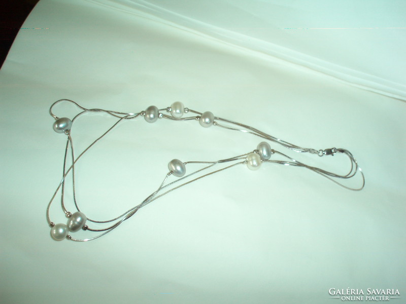 Beautiful 3-row silver necklace with large true pearls.