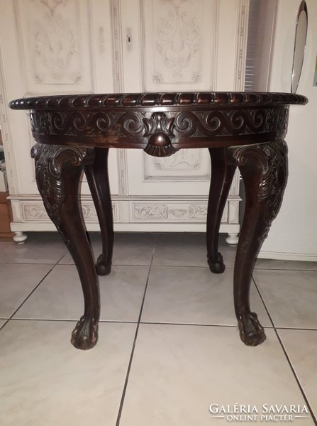 Rare, beautifully carved renaissance table with eagle claw legs