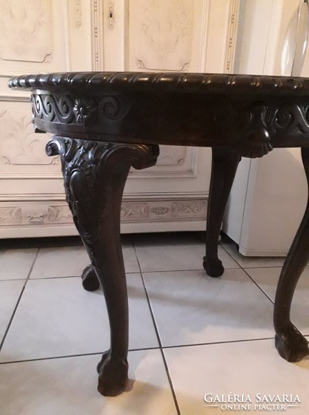 Rare, beautifully carved renaissance table with eagle claw legs