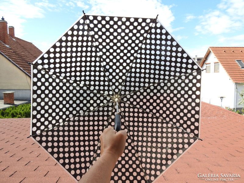 Very retro black and white polka dot nylon umbrella