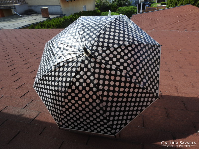 Very retro black and white polka dot nylon umbrella