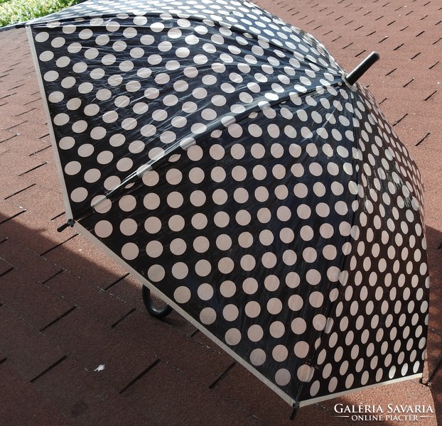 Very retro black and white polka dot nylon umbrella