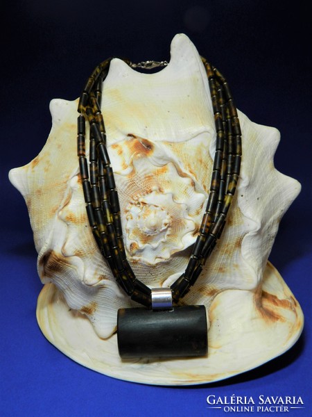 Genuine amber necklace with huge amber pendant with 4 rows of silver fittings