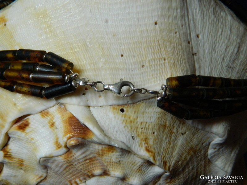 Genuine amber necklace with huge amber pendant with 4 rows of silver fittings