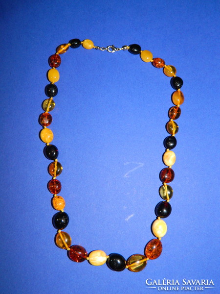 Beautiful multi-type amber necklace knotted by eyes