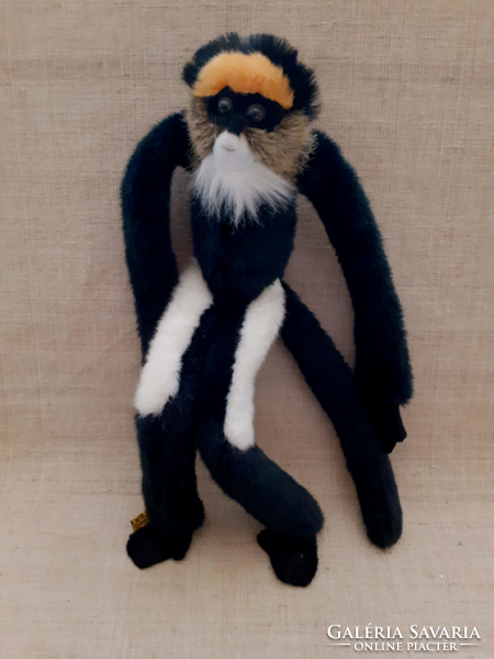 Nice condition wild marked plus monkey with glass eyes can be held together with velcro
