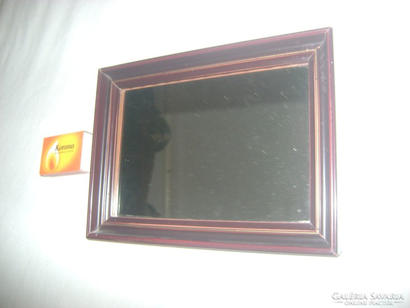 Small wall mirror with wooden frame, shaving mirror