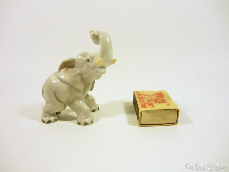 Herend, elephant with raised handle 8.5 Cm hand-painted porcelain figurine, flawless! (P093)