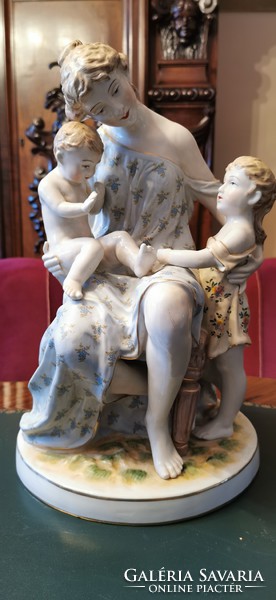 Mother with children - monumental porcelain figurine