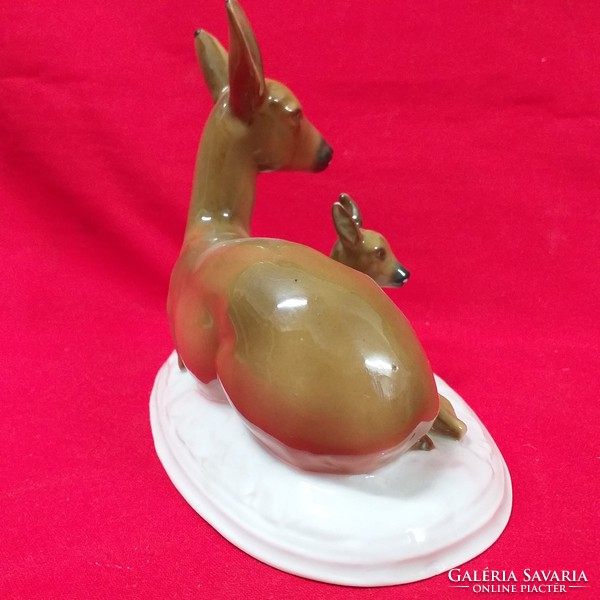 German, German fasold & stauch bock wallendorf porcelain figurine with deer kid lying.