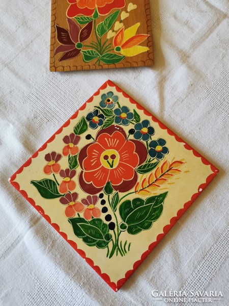 Hand painted tiles, mural, dish washer and wall cutting board together