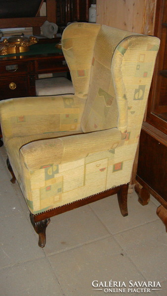 Armchair with handles to be renovated.