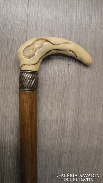 Bamboo walking stick with fishbone and silver grip, 1910s