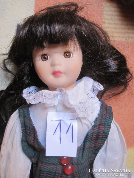 Listed porcelain doll, with real hair! 11.