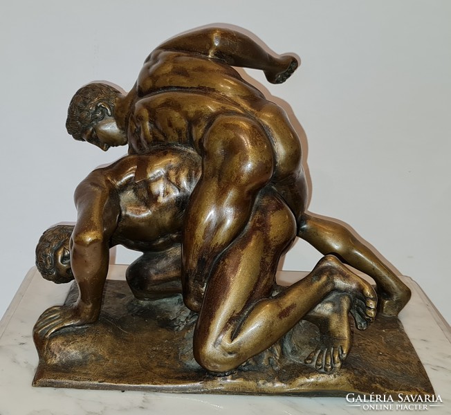 Naked wrestlers - bronze statue - on white marble pedestal