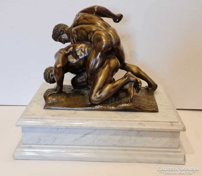 Naked wrestlers - bronze statue - on white marble pedestal