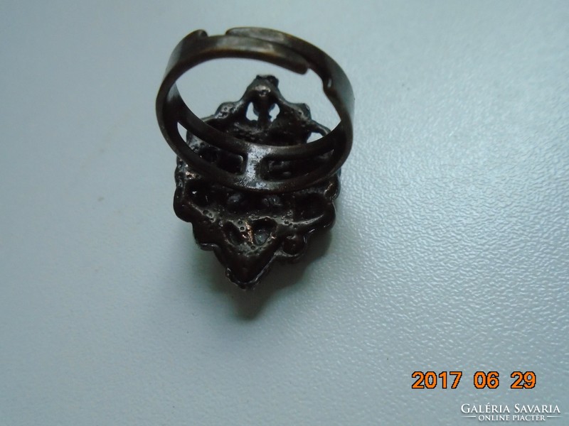 Antique goldsmith's work, polished stone ring with rosette on it