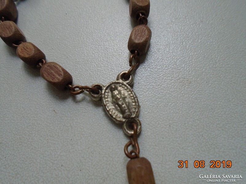 Religious pendant with small wooden pearl bracelet