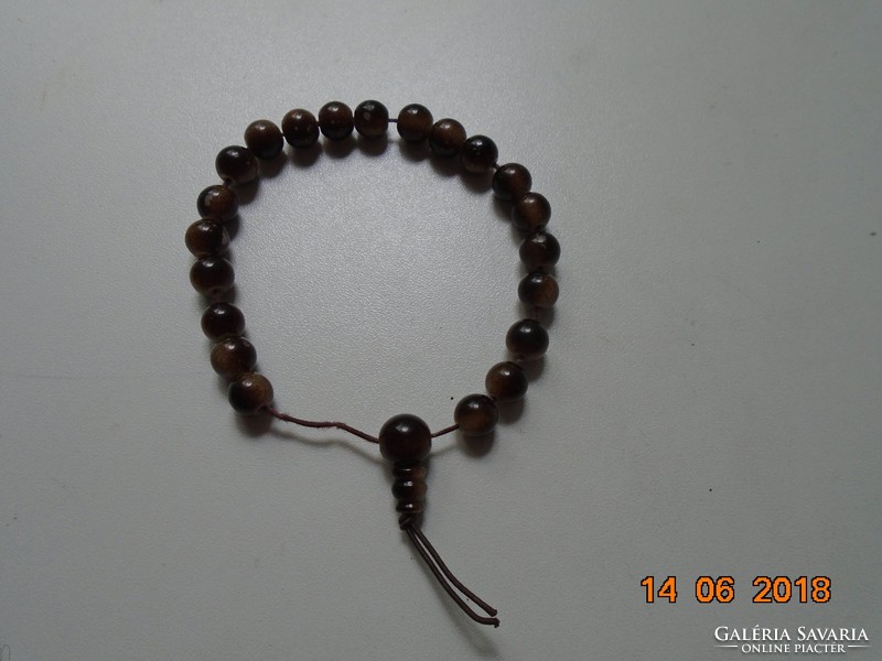 Mala with shades of brown with 21 grains and guru pearls