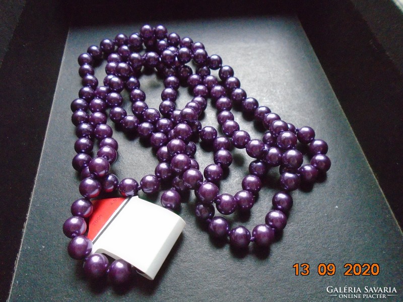 Long necklace made of hand-crocheted purple beads
