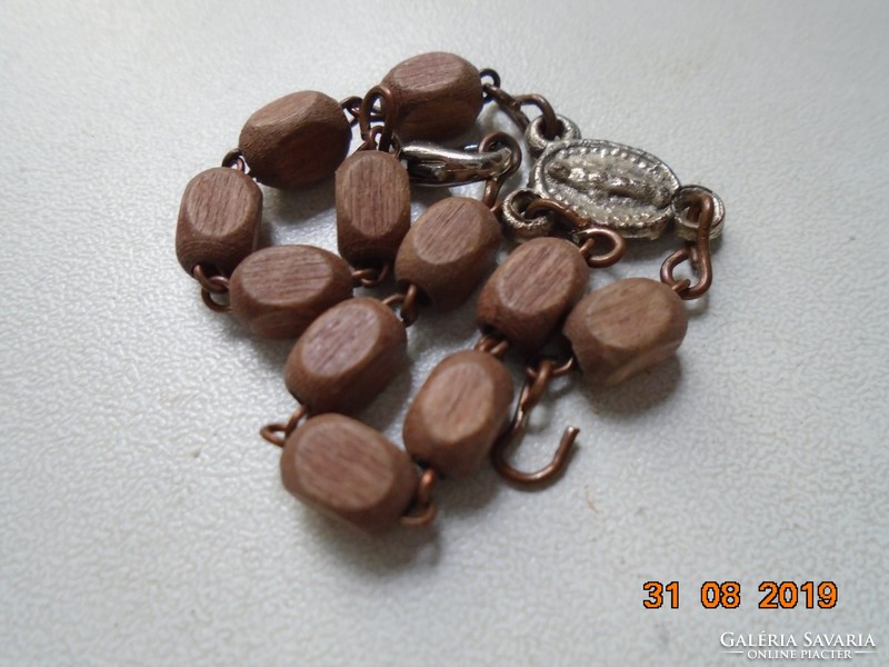 Religious pendant with small wooden pearl bracelet