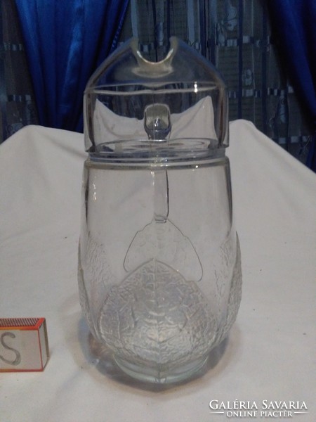 Glass jug decorated with convex leaves