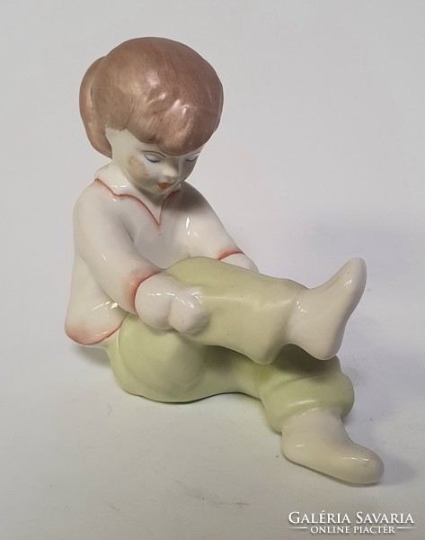Aquincum porcelain figurine, statue of little girl with pigtails sitting