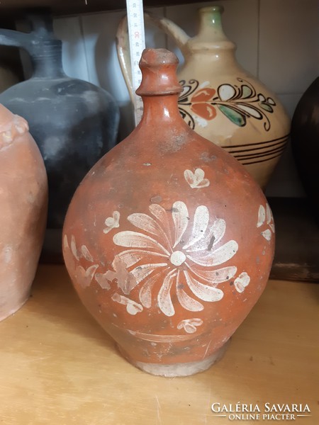 Folk pottery, glazed tile jar, guard