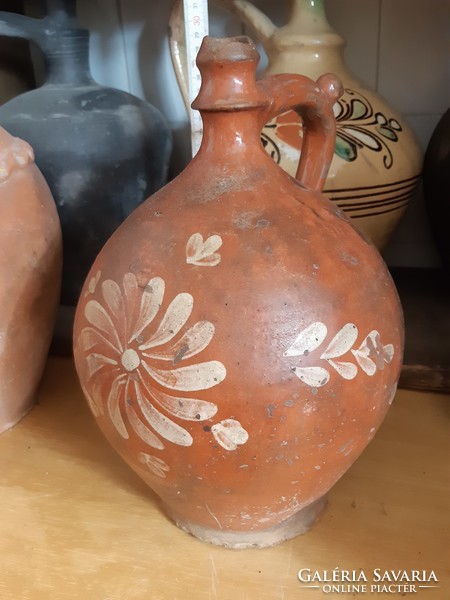 Folk pottery, glazed tile jar, guard