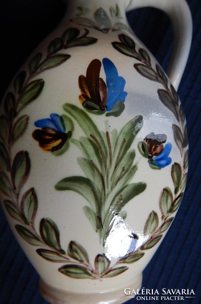 Ceramic jar with folk motifs