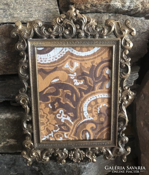 Italian baroque patterned picture frame pair