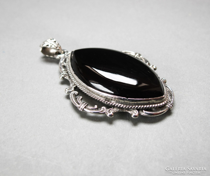 Old, silver, onyx mourning jewelry, relic pendant.