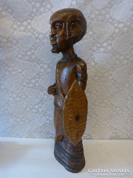 African mask, sculpture / tree.