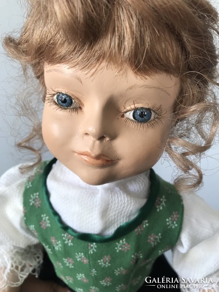 Old porcelain doll is very beautiful