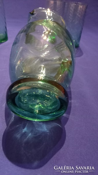 Green twisted glass pitcher with glasses