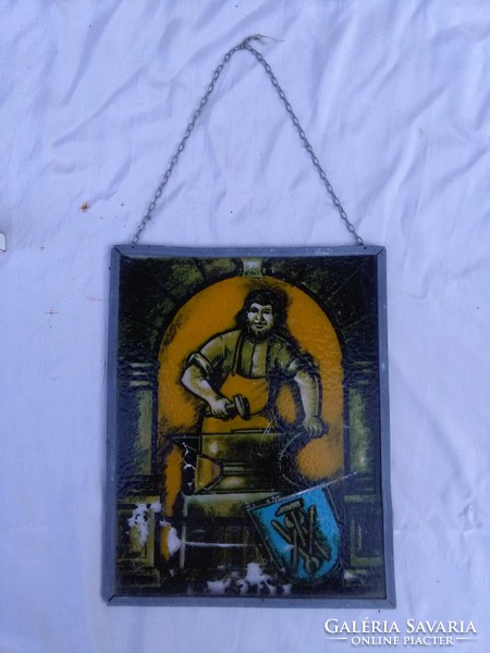 Stained glass window decoration in a metal frame - master blacksmith