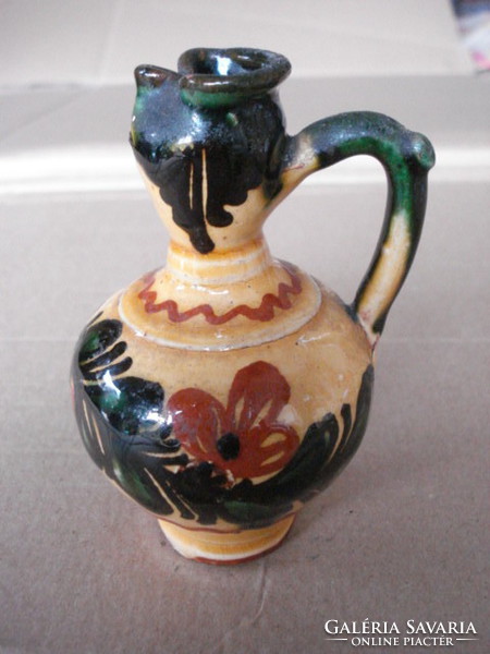Folk pottery. Pitcher with ears