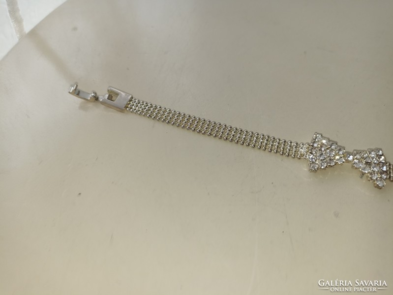 Jewelry bracelet with bow decorated with zircon stones