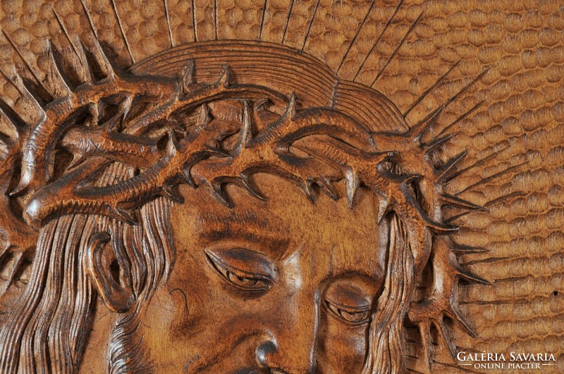 Portrait of suffering Jesus Christ, carved relief