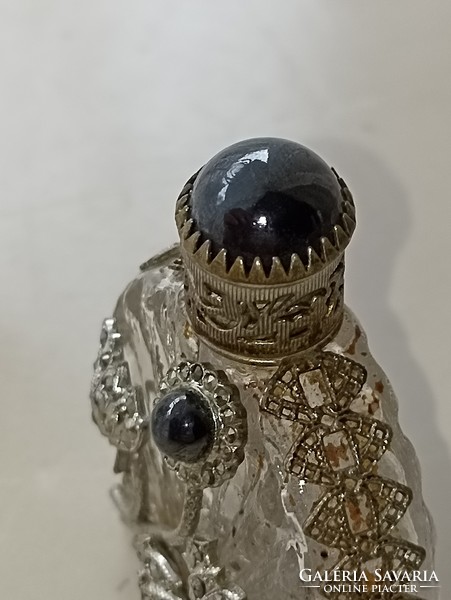 Old bottle of perfume or cologne with a pipette decorated with onyx stone and marcasite