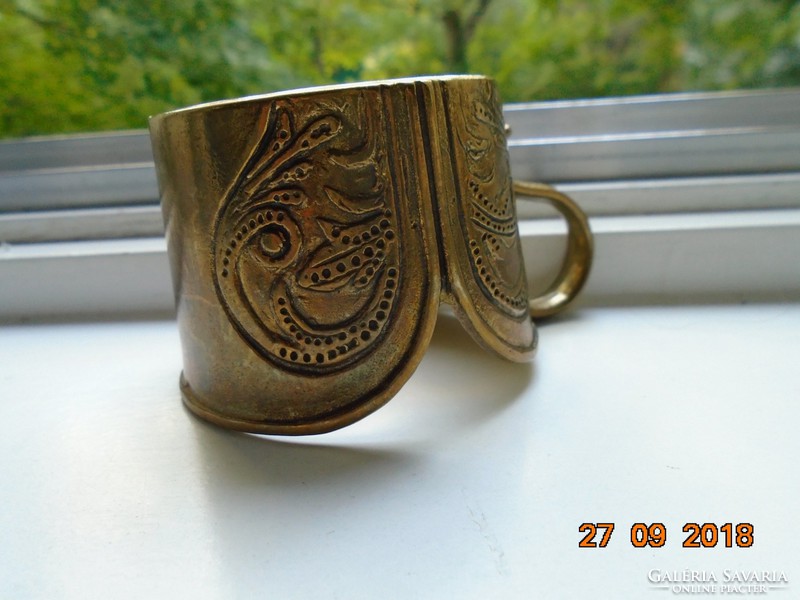 Bronze cast glass cup holder with Art Nouveau floral motif and curved shapes