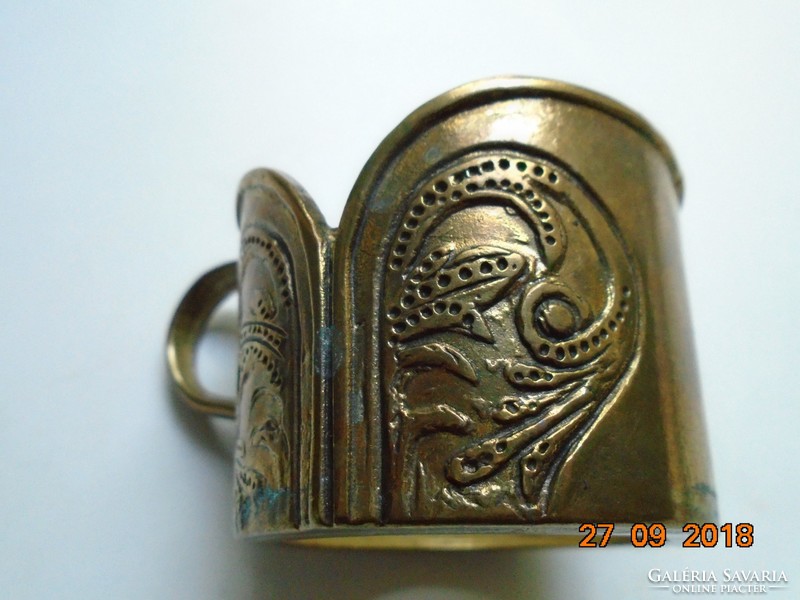 Art Nouveau floral motif with curved shapes, bronze cup holder