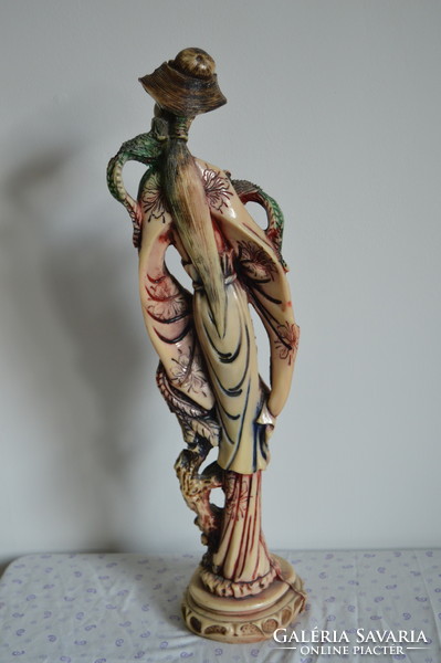 1 Pair of old large Far Eastern resin sculptures, figurines