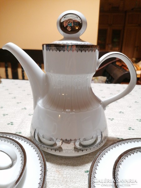 German tea or coffee pot with two tea sets. Snow white-silver design, elegant, beautiful