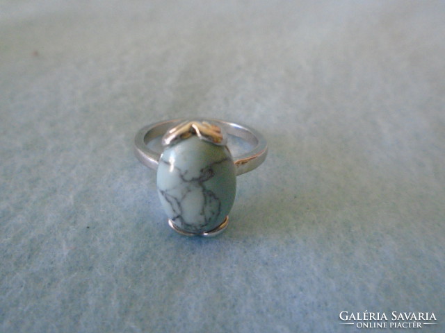 Rhodium-plated anti-allergenic women's ring with turquoise stone inner size 18 mm new not used. Post 700 ft ..