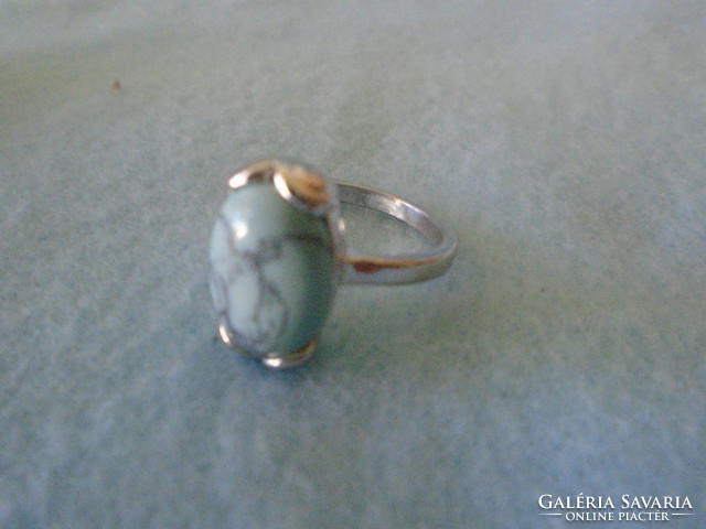 Rhodium-plated anti-allergenic women's ring with turquoise stone inner size 18 mm new not used. Post 700 ft ..