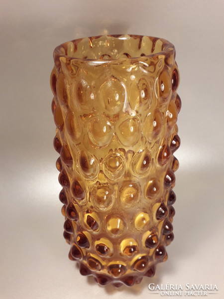 Thick-walled, amber-colored, heavy broken glass vase with cam, glass below